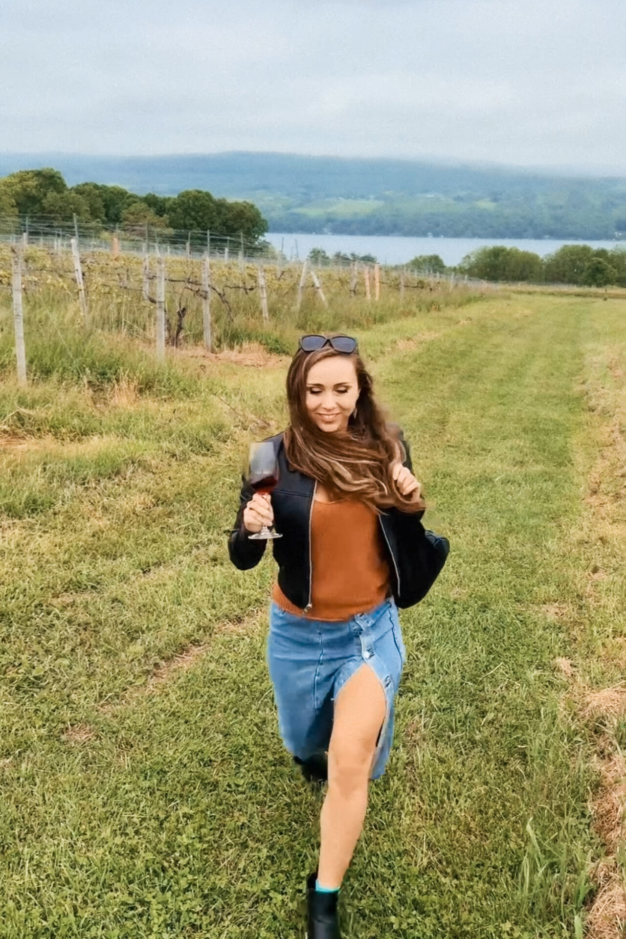 Paige at a vineyard in the Finger Lakes along hte Lake Seneca Wine Trail