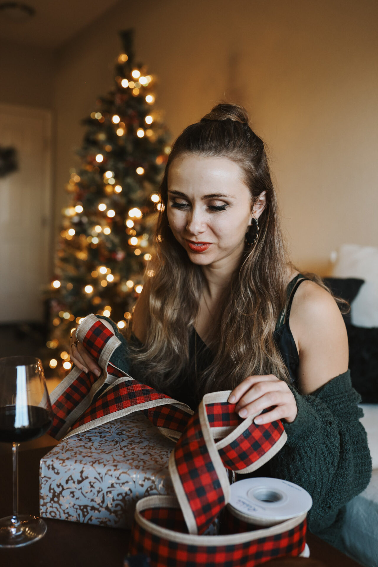 WIne with Paige wrapping holiday gifts for wine lovers