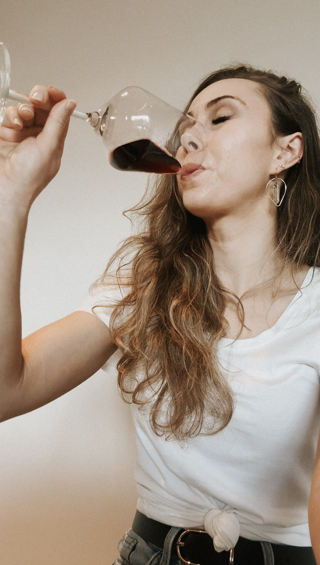 Woman drinking red wine