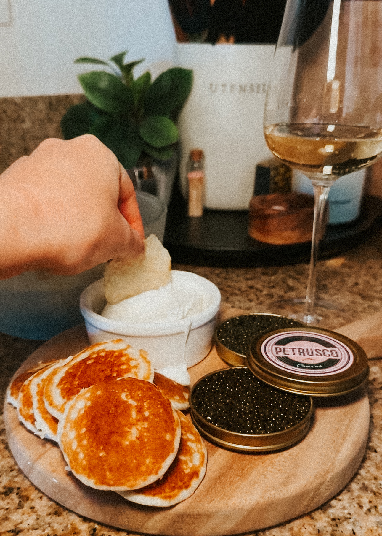 Petrusco Caviar charcuterie board with sparkling wine