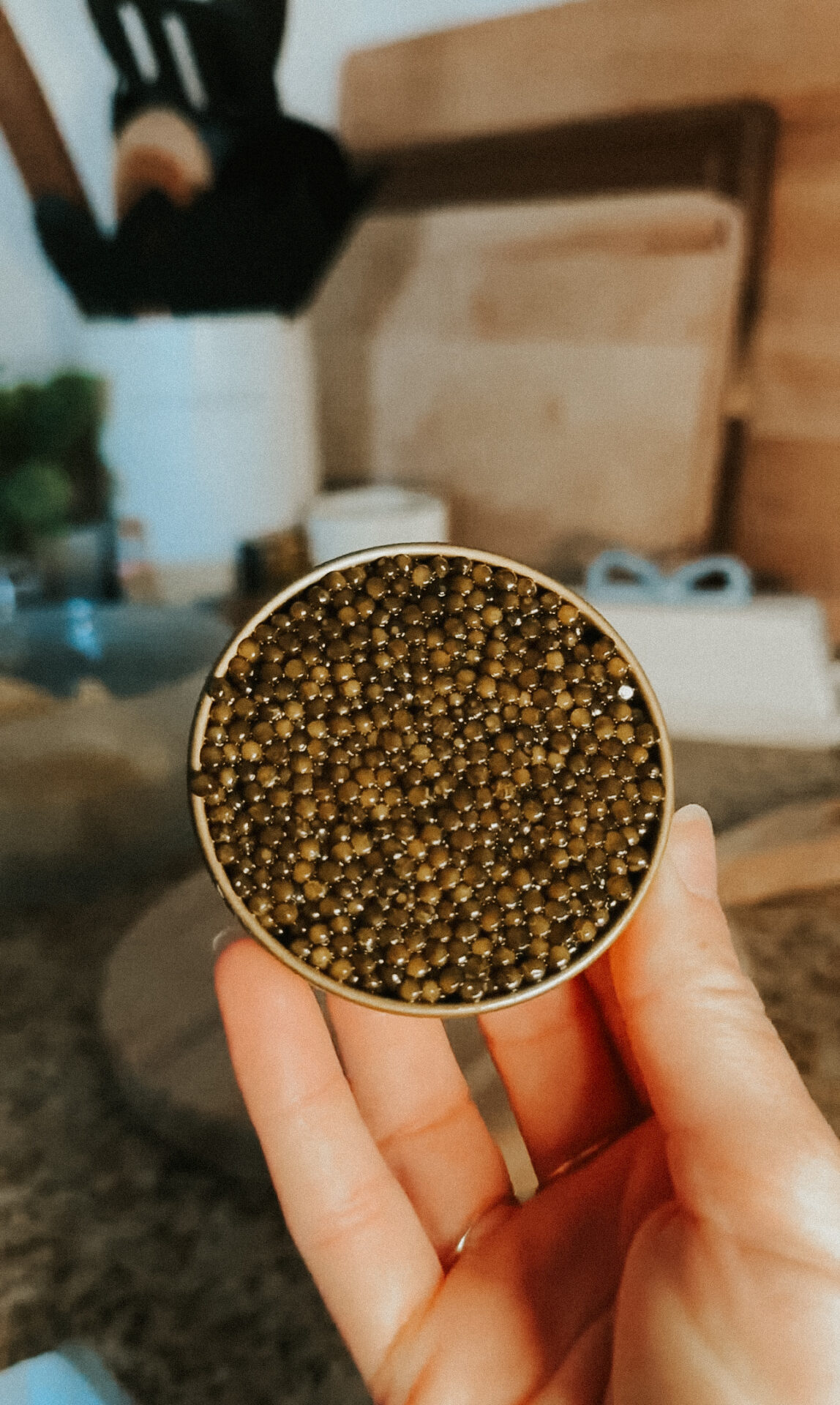 Petrusco Royal Ossetra Caviar tin in hand